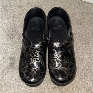 Dansko Women's Black and Silver Patterned Clogs